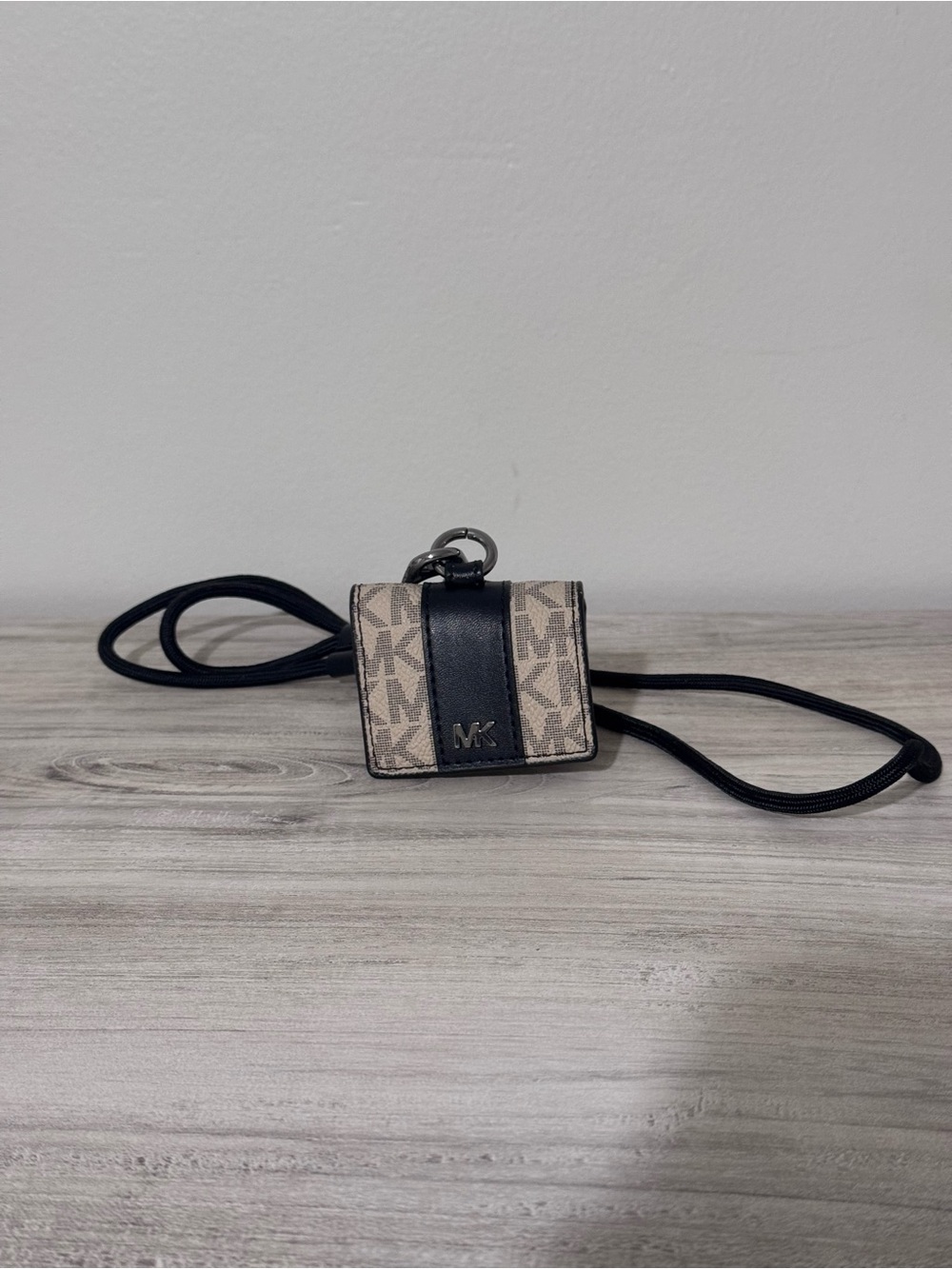 NWOT Defect Michael Kors Beige and Black AirPod Case